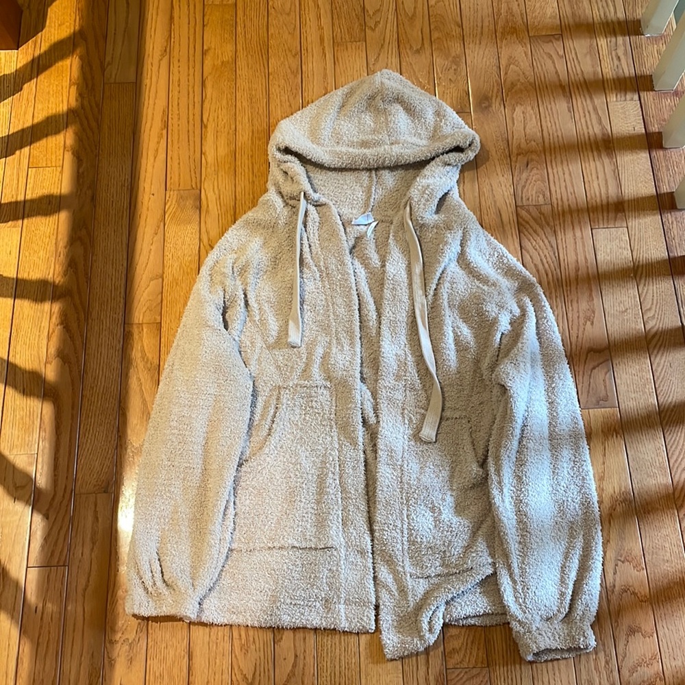 Out from under fluffy cardigan/hoodie